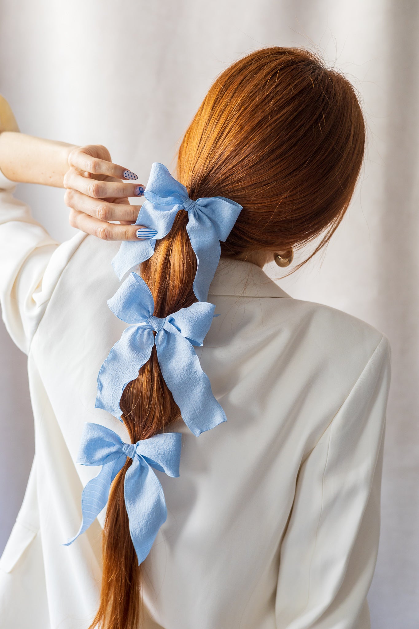 Échantillon - Boucle sur crochet métallique crème