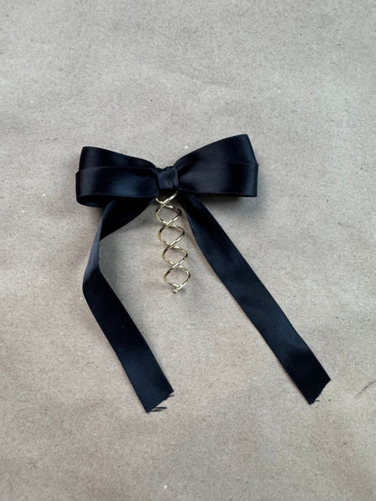 Sample - Black ribbon bow on spiral